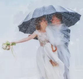 De charme & extra betekenis van een regenachtige trouwdag